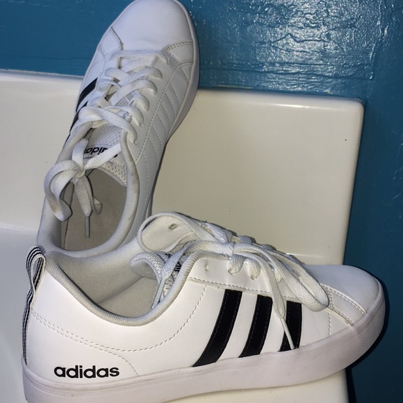 adidas with black stripes on one side